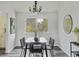Bright dining area with a modern table, stylish decor, and plenty of natural light at 1590 S Macon St, Aurora, CO 80012