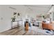 Bright living room with vaulted ceilings, modern decor, and stylish furniture at 1590 S Macon St, Aurora, CO 80012