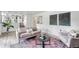 Comfortable living room with stylish decor, neutral tones, and lots of natural light at 1590 S Macon St, Aurora, CO 80012