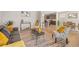Inviting open-concept living area with modern furnishings and decor and open floorplan at 868 N Quatar St, Aurora, CO 80018
