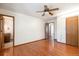 Bedroom boasts wood floors and has convenient ensuite bathroom access at 7732 Xavier Ct, Westminster, CO 80030