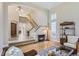 A grand foyer features a staircase and high ceilings at 10529 Dacre Pl, Lone Tree, CO 80124
