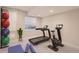 Bright home gym featuring modern exercise equipment and lots of room to workout at 10529 Dacre Pl, Lone Tree, CO 80124