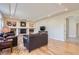 A living room has a fireplace and built-in shelving at 10529 Dacre Pl, Lone Tree, CO 80124