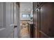 Bathroom with neutral tile, a modern vanity and dark cabinets and a shower curtain at 395 Zephyr St, Lakewood, CO 80226