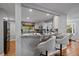 Kitchen with granite countertops and stainless steel appliances open to the dining room at 395 Zephyr St, Lakewood, CO 80226