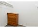 Walk-in closet features carpet and built-in clothes rod perfect for storage at 5719 S Lowell Blvd, Littleton, CO 80123