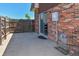 Brick patio with sliding glass door access, perfect for indoor-outdoor living at 5719 S Lowell Blvd, Littleton, CO 80123