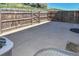Spacious concrete patio with a wooden fence, perfect for outdoor living at 5719 S Lowell Blvd, Littleton, CO 80123