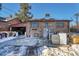 Rear view of home showing appliances and covered area at 2990 Sheridan Blvd, Denver, CO 80214