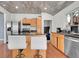 Spacious kitchen with stainless steel appliances and an island at 2990 Sheridan Blvd, Denver, CO 80214