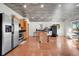 Bright kitchen with stainless steel appliances and wood flooring at 2990 Sheridan Blvd, Denver, CO 80214