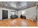 Living room with hardwood floors and lots of natural light at 2990 Sheridan Blvd, Denver, CO 80214