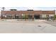 Brick commercial building with modern windows, landscaping, and street access at 1203 24Th St, Denver, CO 80205