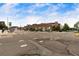 Street view of brick building with street parking and sidewalks with crosswalks at 1203 24Th St, Denver, CO 80205