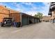 A detached garage and carport offer parking and storage space on this property at 1203 24Th St, Denver, CO 80205