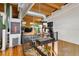 A second story gym area is open to the home below and features plenty of workout equipment and a TV at 1203 24Th St, Denver, CO 80205