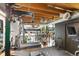 Well-equipped home gym features industrial-style architecture and modern fitness equipment at 1203 24Th St, Denver, CO 80205