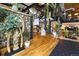 Unique and well-lit interior featuring metal and rock design elements and greenery at 1203 24Th St, Denver, CO 80205
