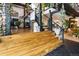 Staircase and entry featuring hardwood steps, black metal railings and exposed beams at 1203 24Th St, Denver, CO 80205