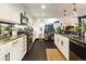 Modern kitchen boasts stainless steel appliances and sleek countertops at 1203 24Th St, Denver, CO 80205