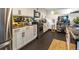 Bright kitchen features stainless appliances, modern cabinets, and ample counter space at 1203 24Th St, Denver, CO 80205