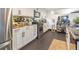 Well-equipped kitchen featuring stainless steel appliances, ample counter space, and white cabinets at 1203 24Th St, Denver, CO 80205