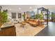 Spacious living room area featuring modern furniture, hardwood floors, and tasteful decor at 1203 24Th St, Denver, CO 80205