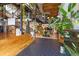 Spacious living room with high ceilings, exposed beams, aquarium and staircase at 1203 24Th St, Denver, CO 80205