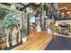 Open area with a staircase, wood floors and a rock wall feature at 1203 24Th St, Denver, CO 80205