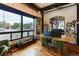 Bright and sunny office space featuring a large window with views of the city at 1203 24Th St, Denver, CO 80205