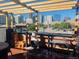 This rooftop deck with city views is perfect for entertaining guests or relaxing at 1203 24Th St, Denver, CO 80205