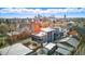 Stunning aerial view highlighting the home's unique rooftop deck and its prime location in a vibrant neighborhood at 2223 W 34Th Ave, Denver, CO 80211