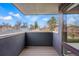 Private balcony offers a tranquil outdoor space with views of neighborhood and clear blue skies at 2223 W 34Th Ave, Denver, CO 80211