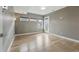 Bright, light-filled bedroom features hardwood floors and ample space with a private balcony entrance at 2223 W 34Th Ave, Denver, CO 80211