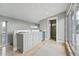 Open kitchenette with a built in drink cooler and modern finishes at 2223 W 34Th Ave, Denver, CO 80211