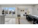 Open living area with sleek design, access to balcony, and bright, airy atmosphere at 2223 W 34Th Ave, Denver, CO 80211
