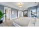Spacious main bedroom boasting light gray walls, hardwood floors, and ample closet space at 2223 W 34Th Ave, Denver, CO 80211
