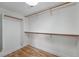 Practical walk-in closet providing ample shelving and hanging space for optimal organization at 2223 W 34Th Ave, Denver, CO 80211