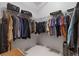 Neatly organized walk-in closet with ample hanging space for clothes at 1555 California St # 414, Denver, CO 80202