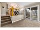A living area that bridges between the kitchen, dining, and the outside patio at 7676 S Olive Cir, Centennial, CO 80112