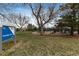 Playground in Foxridge Park with recreational equipment, trees, and open green space at 7676 S Olive Cir, Centennial, CO 80112