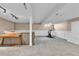 Finished basement area with neutral carpet and a workout space at 4782 E Costilla Ave, Centennial, CO 80122