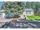 Beautifully landscaped single story home with a well-manicured front yard at 4782 E Costilla Ave, Centennial, CO 80122