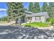 Charming gray two-story home with well-maintained lawn and mature landscaping at 4782 E Costilla Ave, Centennial, CO 80122