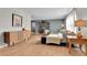 Cozy living room with modern furniture and hardwood flooring at 4782 E Costilla Ave, Centennial, CO 80122