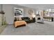 Bright living room with ample natural light, comfortable seating, and decorative accents creating a welcoming space at 4782 E Costilla Ave, Centennial, CO 80122