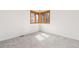 Bedroom with neutral carpet and corner windows for natural light at 11932 W 56Th Cir, Arvada, CO 80002