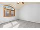 Bedroom showcasing large windows and vaulted ceilings at 11932 W 56Th Cir, Arvada, CO 80002