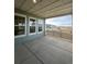 Enjoy serene outdoor views from this covered porch, a perfect relaxation spot at 191 Washington St, Erie, CO 80516